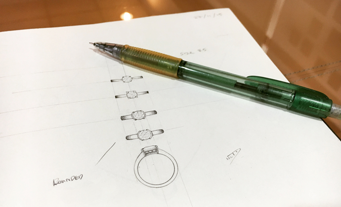 sketchbook with engagement ring designs