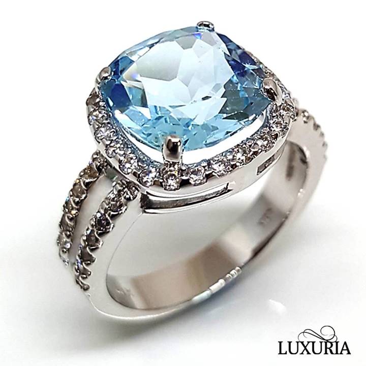 Luxuria Gemstone Rings - Blue topaz ring with diamond simulant halo